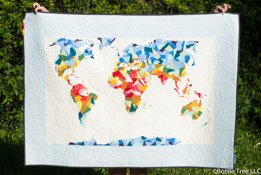 Scrappy Solids Around the World Quilt